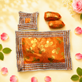 Vibrant Orange Brocade Laddu Gopal Bedding Set with Shimmering Lace